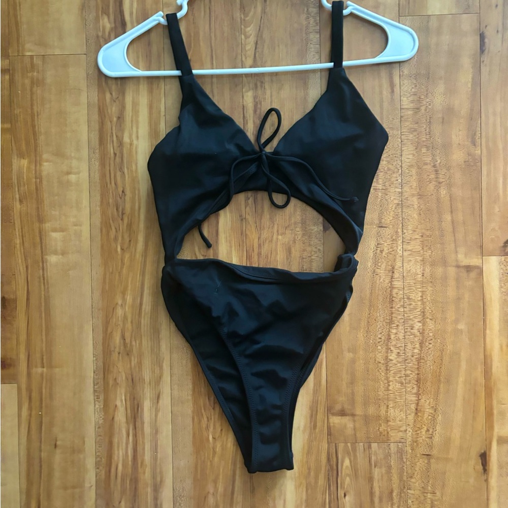 Kendall and Kylie black one-piece swimsuit
